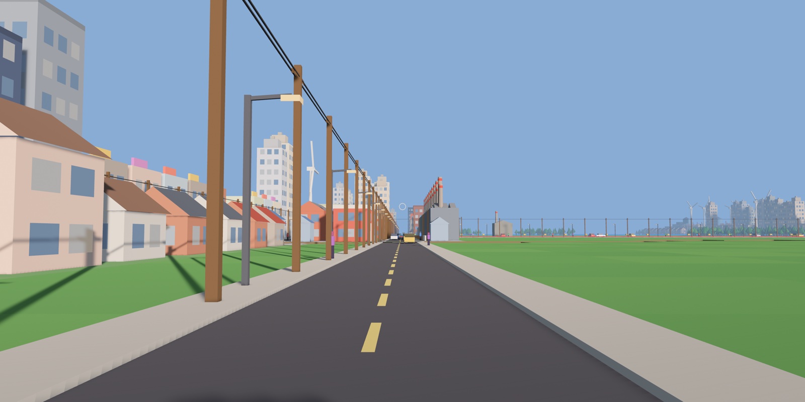 Street-level view down a road lined with houses, power poles and a factory in the distance